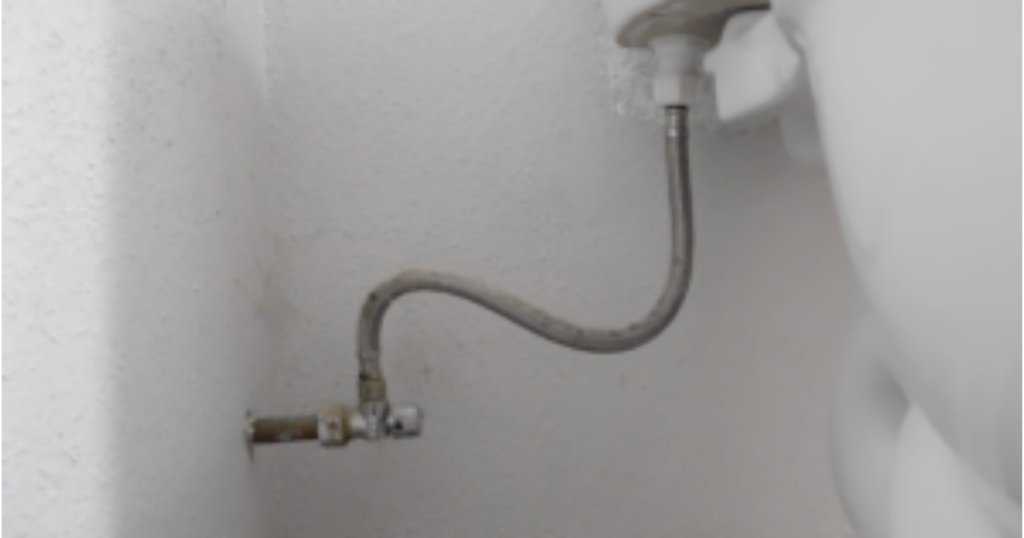 Attach the water supply line to toilet