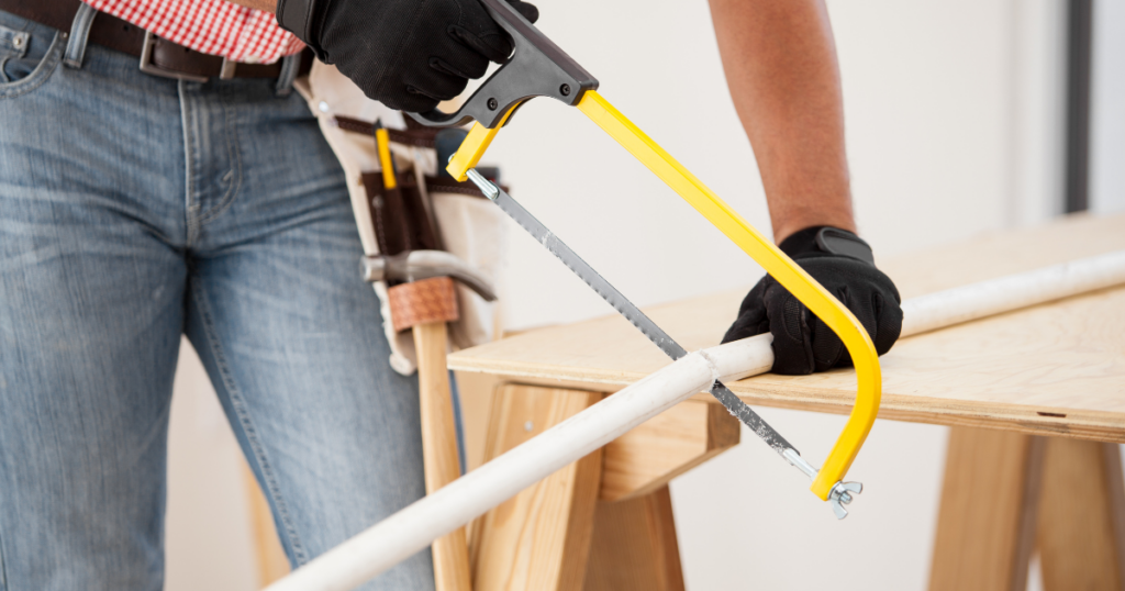 Cutting PVC Pipe With Hacksaw