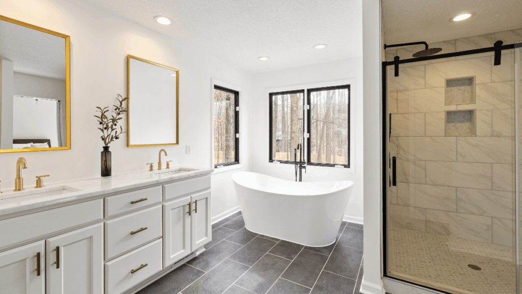 Remodeled bathroom featuring a deep soaking tub and separate walk in shower