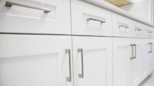 Drilling perfectly aligned cabinet pull holes using a jig for straight cabinet hardware installation